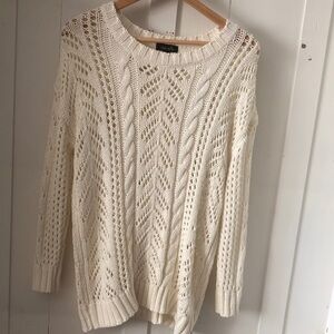 Dee Elle Cream classic, cozy aesthetic, often referred to as a fisherman or Aran